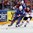 PRAGUE, CZECH REPUBLIC - MAY 12: France's Stephane da Costa #14 tries to play the puck while fending off Latvia's Kristaps Sotnieks #11 during preliminary round action at the 2015 IIHF Ice Hockey World Championship. (Photo by Andre Ringuette/HHOF-IIHF Images)


